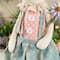 Glitzhome® 29.5" Easter Fabric Girl Bunny with Dangling Legs Figurine